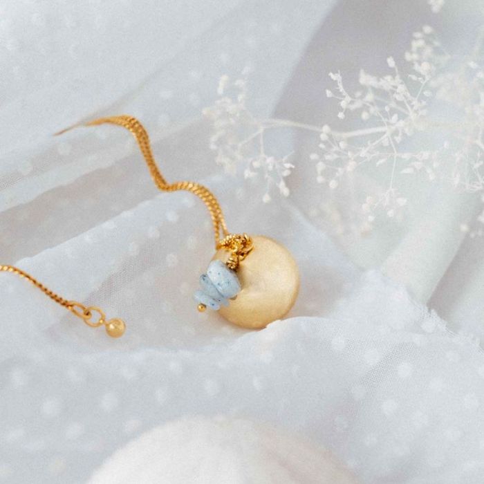 Bola de grossesse doré avec pierre d’aigue-marine
