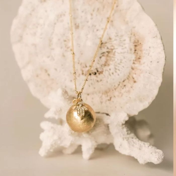 bola de grossesse avec main de fatma