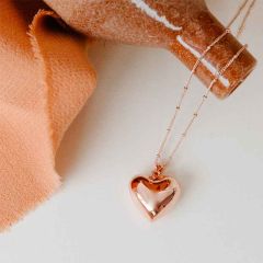 bola en forme de coeur en or rose, idée cadeau pour future maman